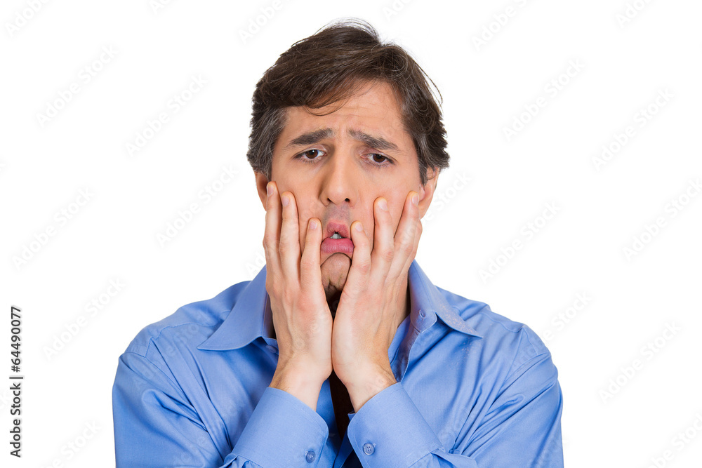 Upset, stressed, depressed business man full of worries Upset, stressed, depressed business man full of worries