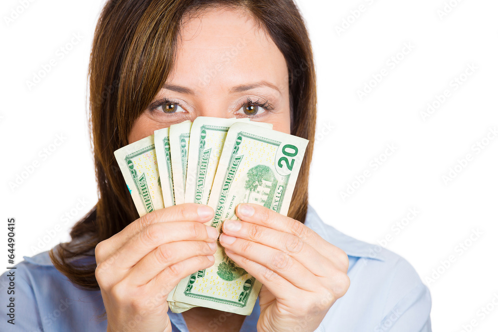 Woman excited about her earnings, holding cash, dollar bills Woman excited about her earnings, holding cash, dollar bills