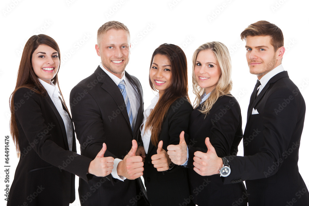 Confident Businesspeople Showing Thumbs Up Confident Businesspeople Showing Thumbs Up
