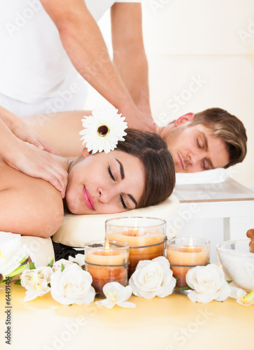 Couple Receiving Massage At Spa