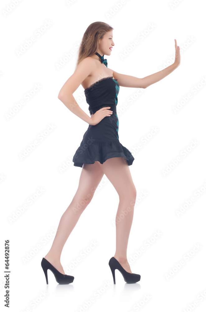 Young pretty woman pushing away virtual obstacle isolated on whi Young pretty woman pushing away virtual obstacle isolated on whi