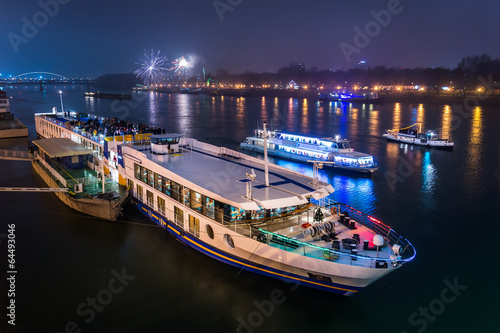Passenger Boat with Fireworks in Background
