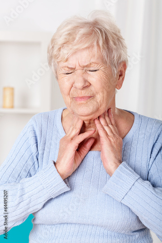 Woman having sore throat