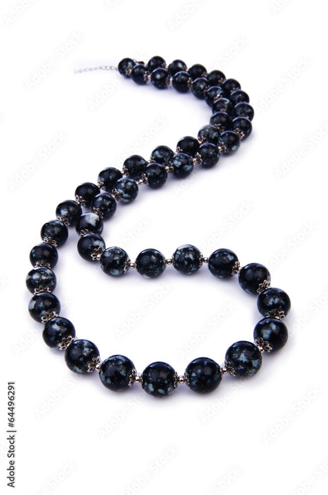 Dark pearl necklace isolated on the white Dark pearl necklace isolated on the white