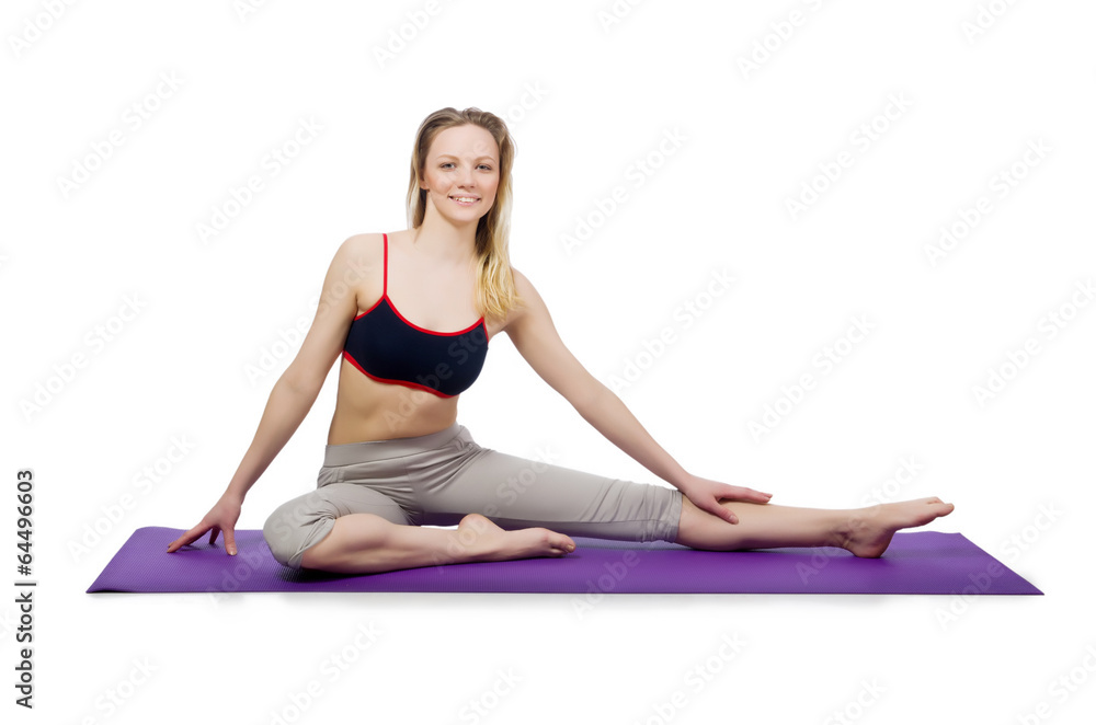 Young female doing exercises on white Young female doing exercises on white