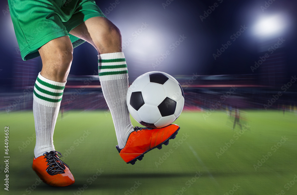 soccer football players and soccer ball with motion blur of spor