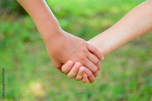 hands of children friends, summer nature outdoor © Khorzhevska