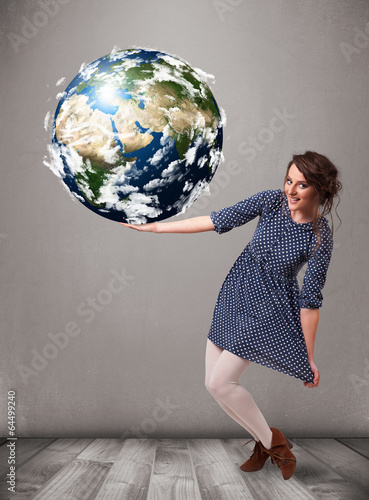 Pretty girl holding 3d planet earth photo