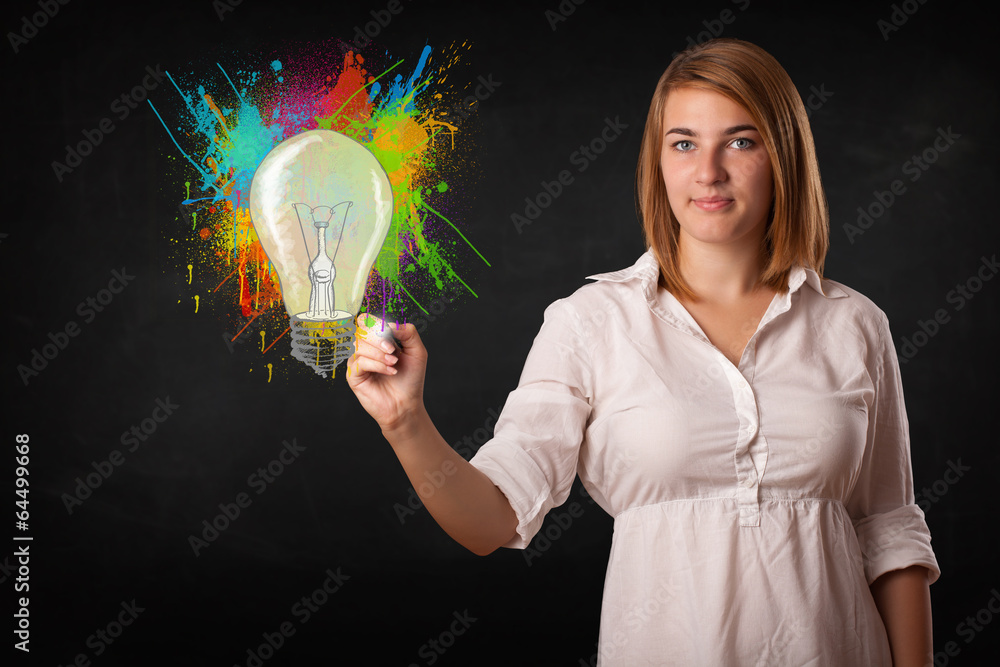 Young lady drawing a colorful light bulb with colorful splashes Young lady drawing a colorful light bulb with colorful splashes