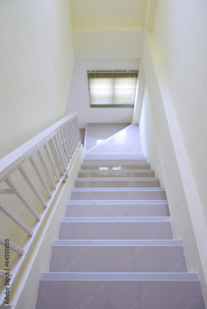 Staircase interior at white home