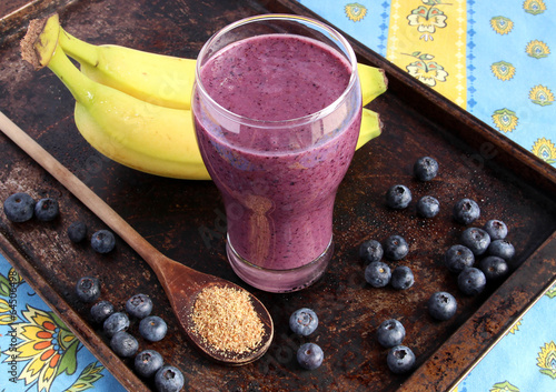 Blueberry smoothie made with banana and ground flax seeds