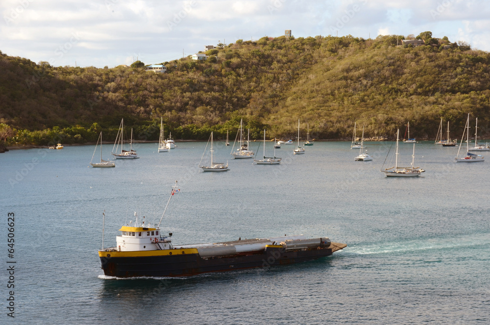 Fototapeta premium Cargo ship near Caribbean island