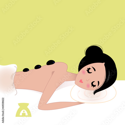 Beautiful Spa woman enjoying Stone therapy