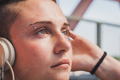 Pretty short hair girl listening to music