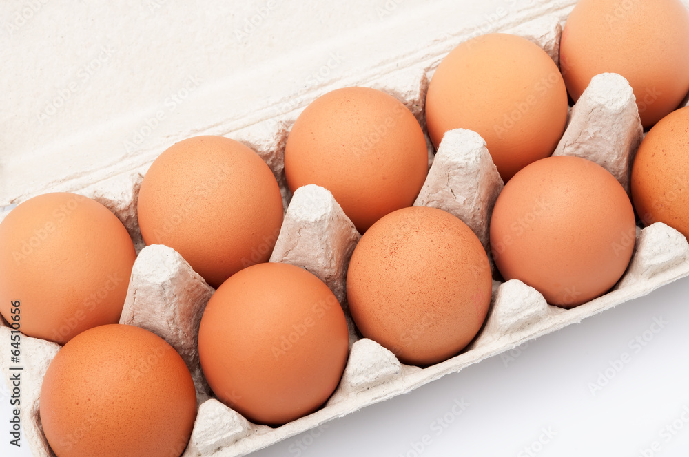 Brown eggs in egg box. Closeup Brown eggs in egg box. Closeup