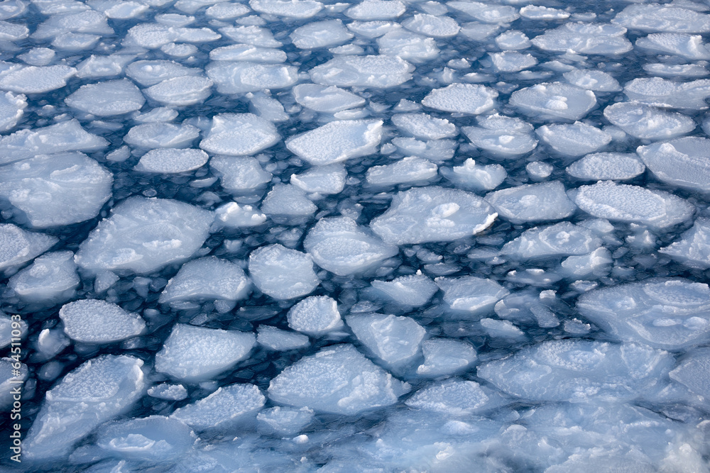 Winter nature background with blocks of ice on frozen blue Sea Winter nature background with blocks of ice on frozen blue Sea
