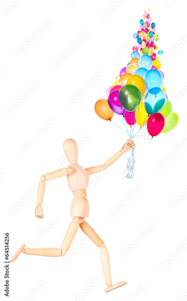 wooden Dummy holding flying balloons isolated wooden Dummy holding flying balloons isolated
