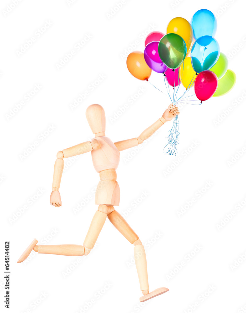 wooden Dummy holding flying balloons isolated wooden Dummy holding flying balloons isolated