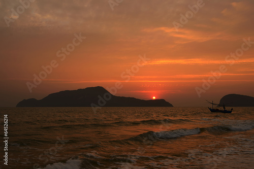 Beautiful sunset above the sea and mountain