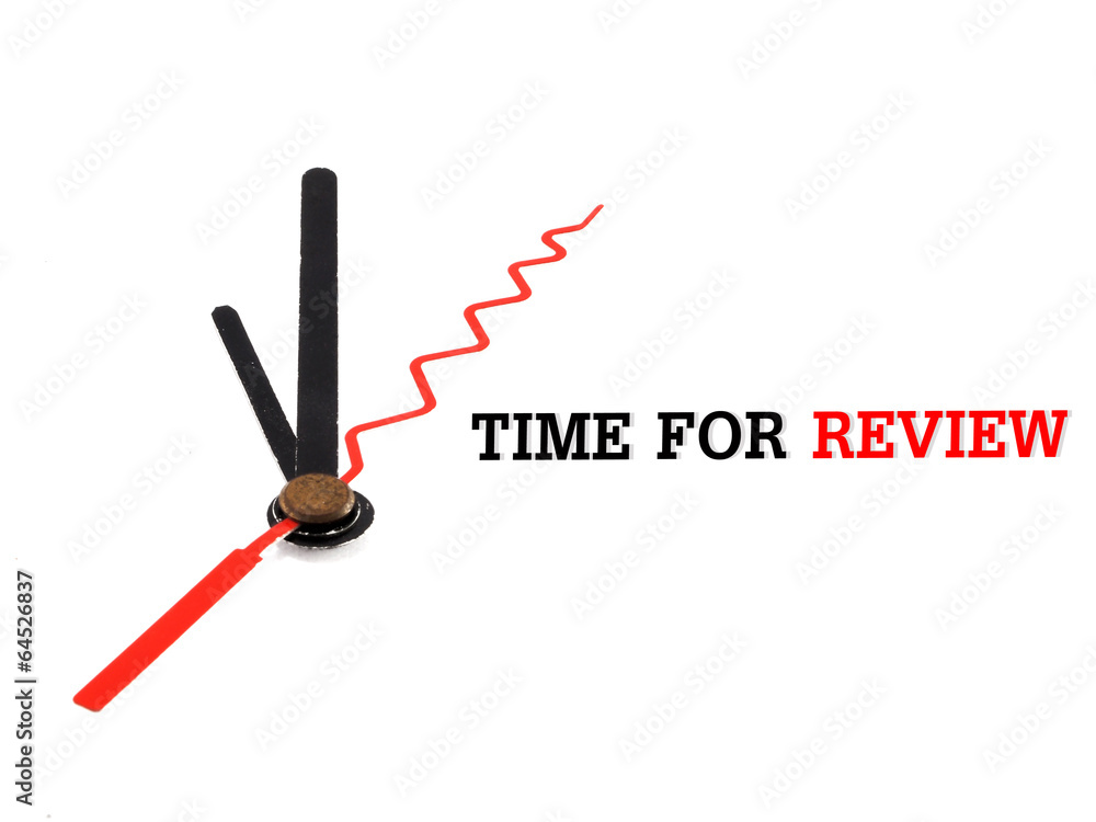 time for review concept clock closeup on white background time for review concept clock closeup on white background