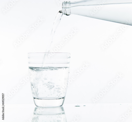Pouring water on glass