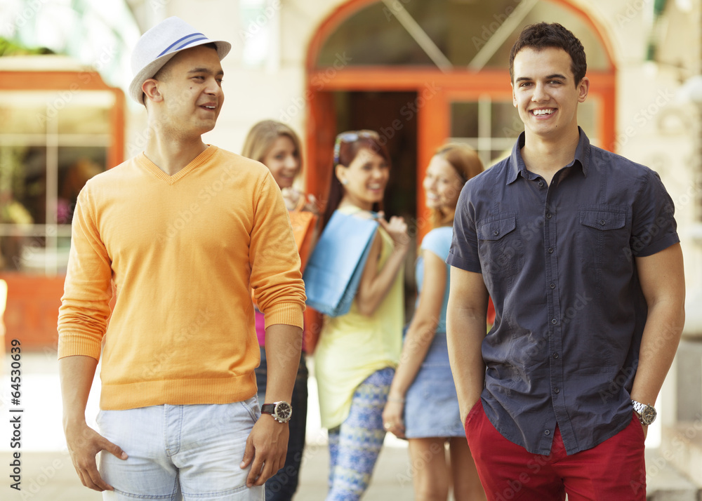 Young people flirting in the city street. Young people flirting in the city street.