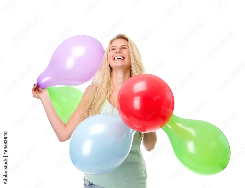 Young woman laughing with colorful balloons Young woman laughing with colorful balloons