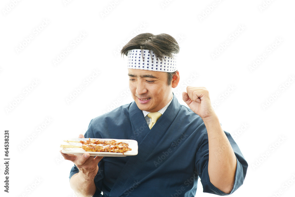 笑顔の焼き鳥屋の主人