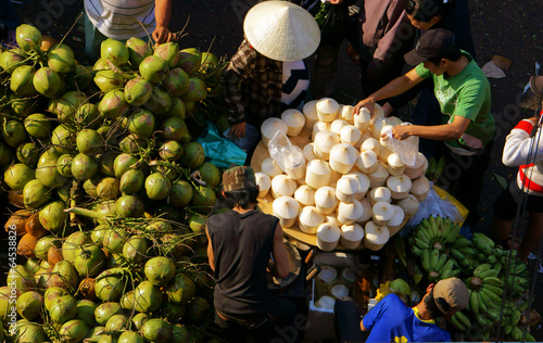 coconut at outdoor farmers market photo