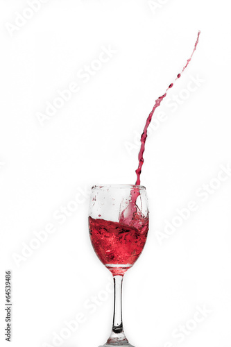Red wine splash with drops