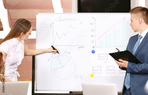 Business people working in ...