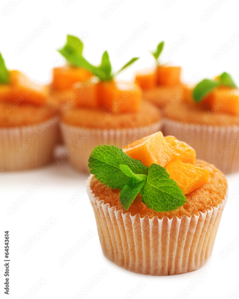 Tasty pumpkin muffins, isolated on white Tasty pumpkin muffins, isolated on white