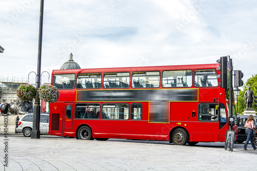 Photos The red double decker bus.