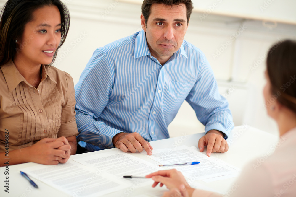 Male and female couple interested in a contract Male and female couple interested in a contract