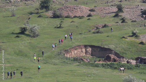 Runners set off on a mountain marathon photo