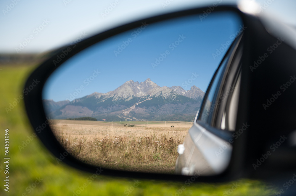 Car rear view of high mountains