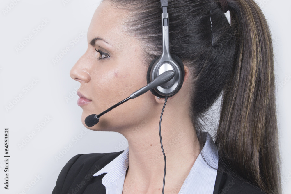 Beautiful Business woman with headphones (headset, office) Beautiful Business woman with headphones (headset, office)