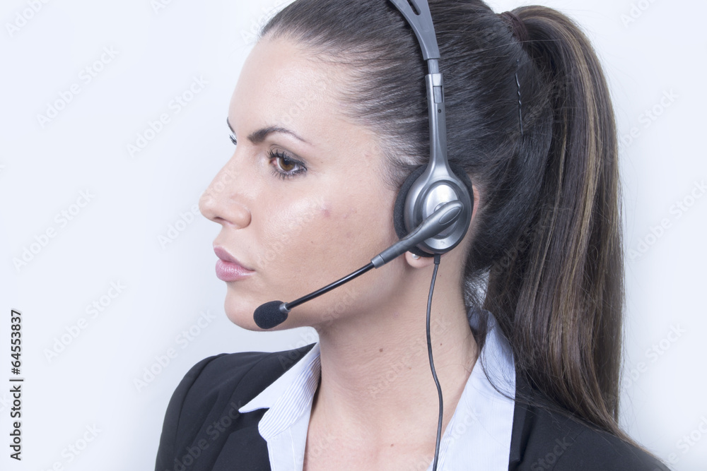Beautiful Business woman with headphones (headset, office) Beautiful Business woman with headphones (headset, office)