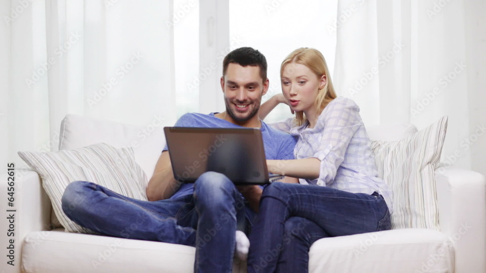 smiling couple with laptop computer at home smiling couple with laptop computer at home