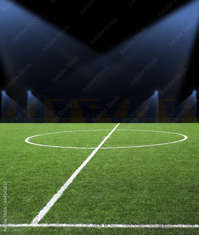 Fototapeta premium Soccer ball on the green field