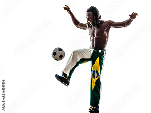 Brazilian  black man soccer player juggling football silhouette