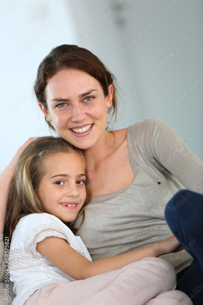 Portrait of mother and daughter in tender moment Portrait of mother and daughter in tender moment