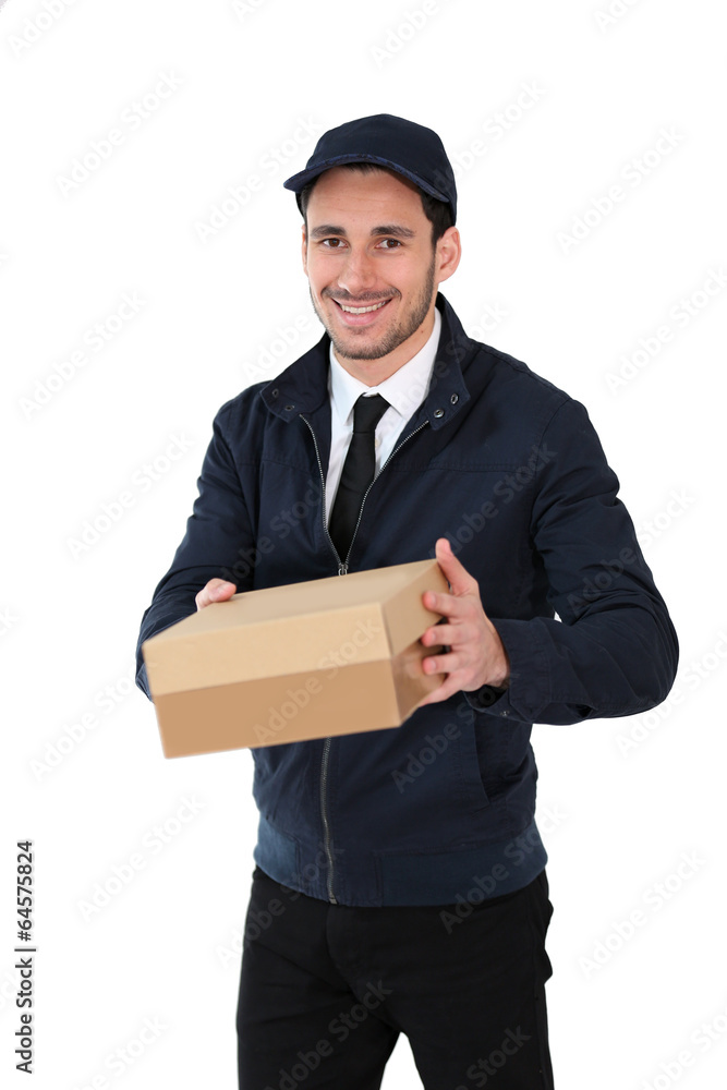 Smiling delivery man holding cardbox, isolated Smiling delivery man holding cardbox, isolated
