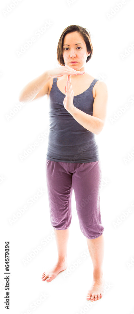 Young woman making time out signal with hands Young woman making time out signal with hands
