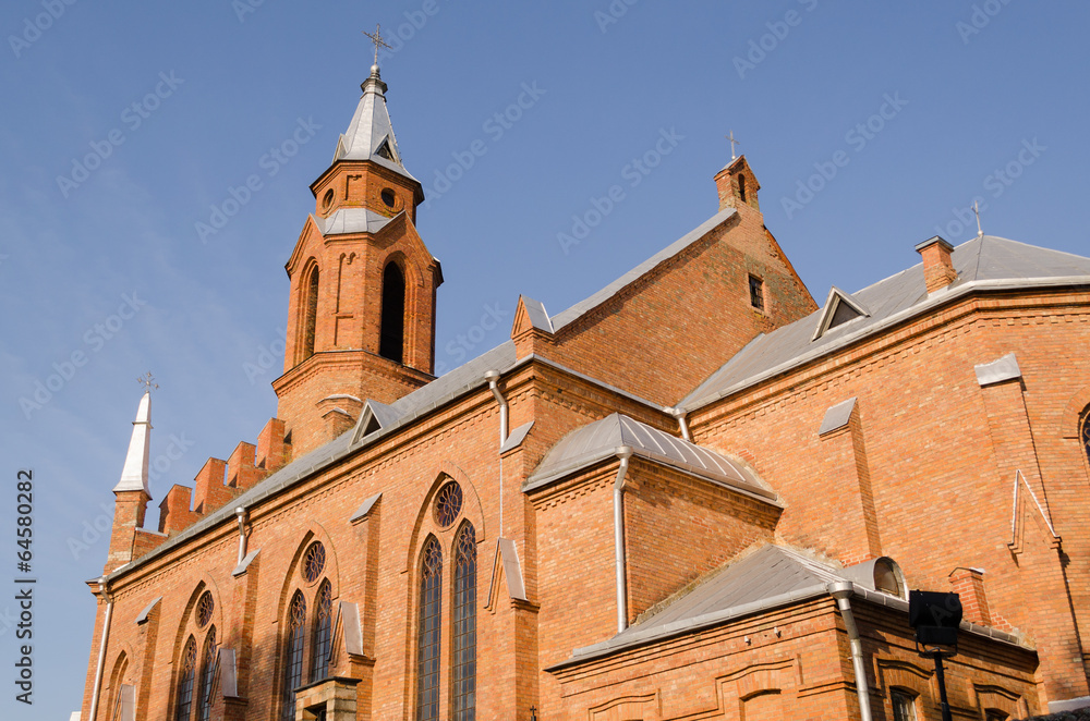 gothic church with crosses on blue sky background gothic church with crosses on blue sky background