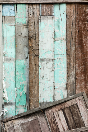 Grunge wooden wall texture with broken window