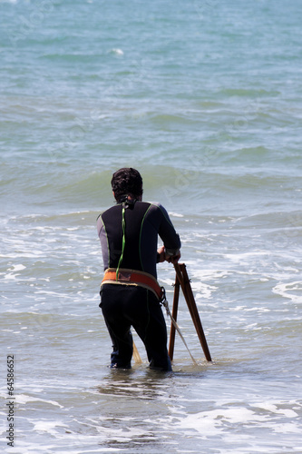 Clams fisherman at work photo