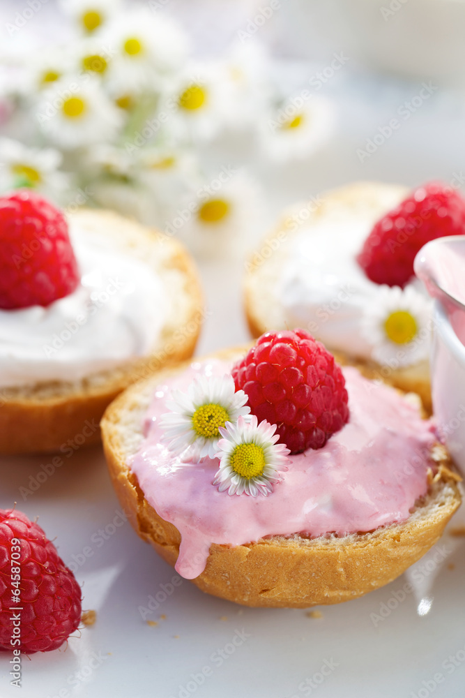 Butter buns with fruity creamy cheese and fresh raspberry Butter buns with fruity creamy cheese and fresh raspberry