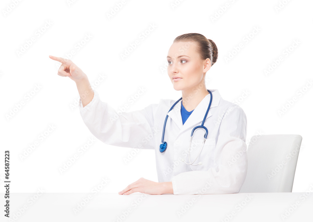 Doctor woman pushing an imaginary button isolated on white Doctor woman pushing an imaginary button isolated on white