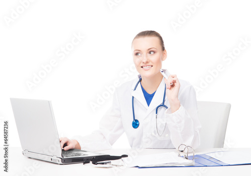 Young, professional and cheerful female doctor working in office